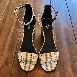 Wedge heels, faux reptile. Very good condition. Rarely worn.